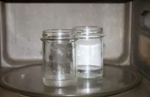 Wash the jars well in hot water with soda and rinse. Sterilize the jars in any way convenient for you. Boil iron lids for 5 minutes over ...