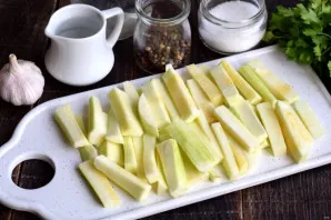 Remove the top layer of zucchini, cut similarly to cucumbers.