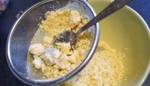 Carefully collect the yolks from the eggs and rub through a sieve or with a knife. Put in a bowl.