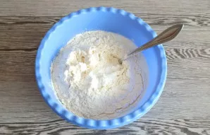 Add flour, baking powder.