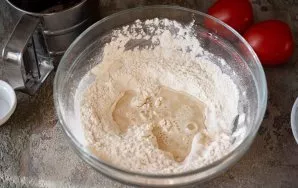 Pour warm water and oil.