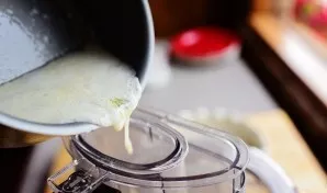 Pour in the melted butter and mix well again.