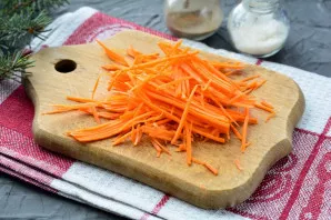Grate the carrots.