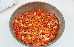 Bake, stirring occasionally, for about 5 minutes.