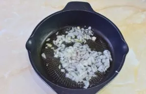Finely chop the onion and fry for 1-2 minutes over low heat.