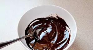 Melt the chocolate and butter by stirring constantly with a spatula. Just do not overdo it, otherwise the chocolate will separate and you...