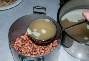 When all the preparatory processes are completed, you can proceed to the main part. Pour the beans with a small amount of broth and put o...