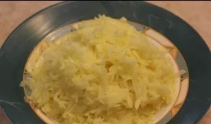 Three potatoes on a coarse grater will help make the meatballs juicy, and they will also have a rather unusual consistency. Squeeze the g...