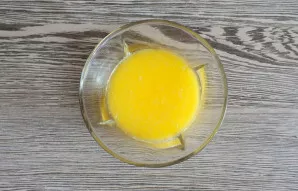 Melt the butter and cool it a little.