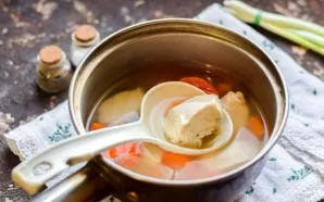 Cut the chicken breast into pieces, put in a saucepan, add vegetables, pour water. Simmer for 30 minutes until all the ingredients are co...