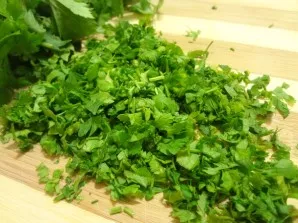 Wash the fresh herbs that you have at hand, let them dry and chop. In this recipe, you can also use fresh cucumber, which will perfectly ...