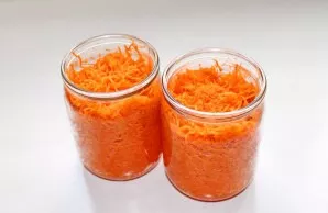 Rinse the jars well with hot water and soda and turn them over on a paper towel to drain the water. Boil the lids for 10 minutes over med...