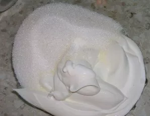 Then, stirring constantly, heat the gelatin over low heat until it is completely dissolved. Mix sour cream with sugar and gelatin.