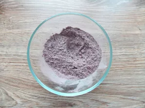 Put flour in a bowl, add half the cocoa, mix.