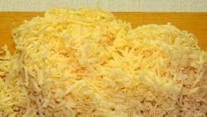 Grate the remaining cheese.