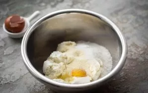 Add semolina, sugar, baking powder.