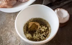 Squeeze the garlic cloves into this bowl through the garlic press, add salt, mustard and khmeli-suneli. Mix everything. The marinade is r...