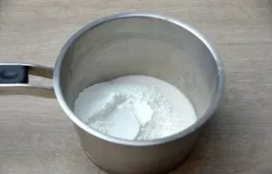 While the dough is resting, prepare the lemon filling. To do this, put sugar, starch in a saucepan, stir, pour 1 glass of water, mix well...