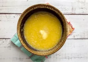 Add melted butter and soda.