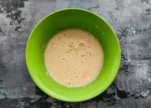 Pour milk at room temperature and beat well.