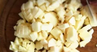 Apples need to be peeled and cut into small cubes.