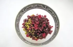 Boil three small beets or two medium-sized beets until tender. Cool, peel and cut into small cubes. Put in a salad.