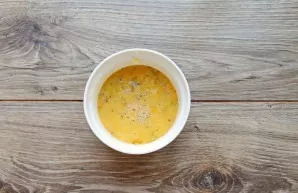 Grease a microwave-safe dish with butter and pour the omelette mixture into it. The mass should be no more than 2/3 of the volume of the ...