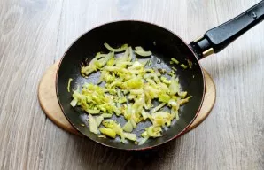 Simmer the vegetables over medium heat for 3 minutes, stirring.
