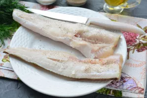 Salt and pepper the fish.