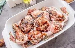 Pour half the total rate of sauce, grease the chicken well with it.