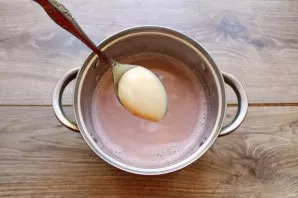 Pour condensed milk into cocoa and stir until smooth.