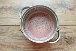 Pour milk into a saucepan with a thick bottom and add cocoa powder. Stir everything with a whisk until smooth.