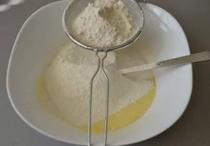 Sift the flour, knead the dough.