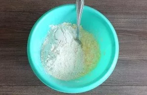 Add flour, baking powder.