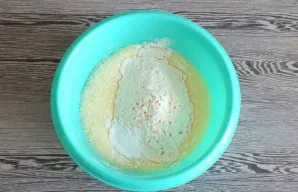 Add flour, baking powder, vanilla extract. Mix it up.