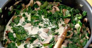 Add cream, salt, pepper, nutmeg and bring to a boil.