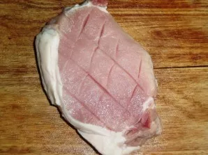 Make shallow notches at the top and bottom.