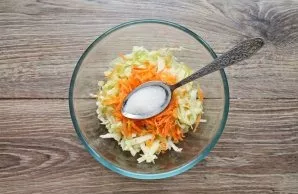 Add sugar to the bowl and mix.