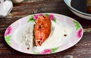 Then dip each piece in flour.