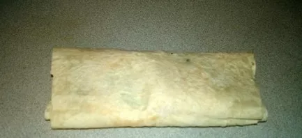 On each lavash tape put the filling, about 2 tablespoons. Add spices to taste and form rolls.