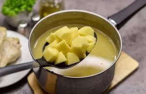 Put the chopped potatoes in a saucepan and cook for 10 minutes.