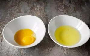 Carefully divide the eggs into whites and yolks.