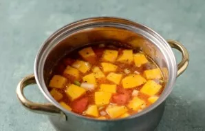 Put all the vegetables in a saucepan, pour water. Add all the spices, salt. Bring to a boil, reduce the temperature to medium-low, boil t...