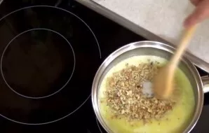 Melt the butter over low heat, add sugar and nuts, mix well. Pour the hot cake with hot icing and place in a still hot oven (but turned o...