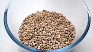 After that, pour pearl barley into the cauldron. Put peeled garlic cloves on the surface. Pour boiling water until it is 1 cm above the i...