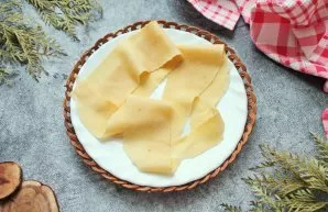 Roll out the dough into a layer no more than 2 millimeters thick and cut into strips.