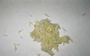 Crush the garlic or just finely chop it with a knife.