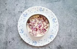 Finely chop the red onion and sprinkle over the egg whites.