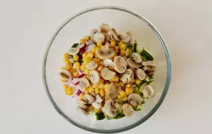 Add corn and canned mushrooms.