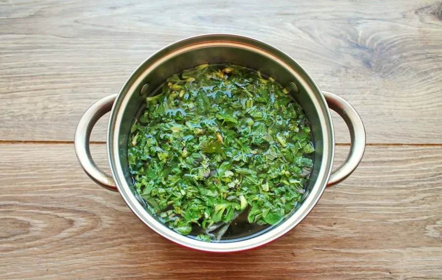 Put the greens in a pot with tea